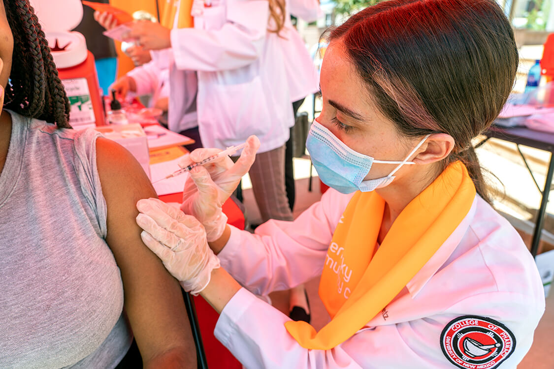 Student Pharmacist administering a vaccine