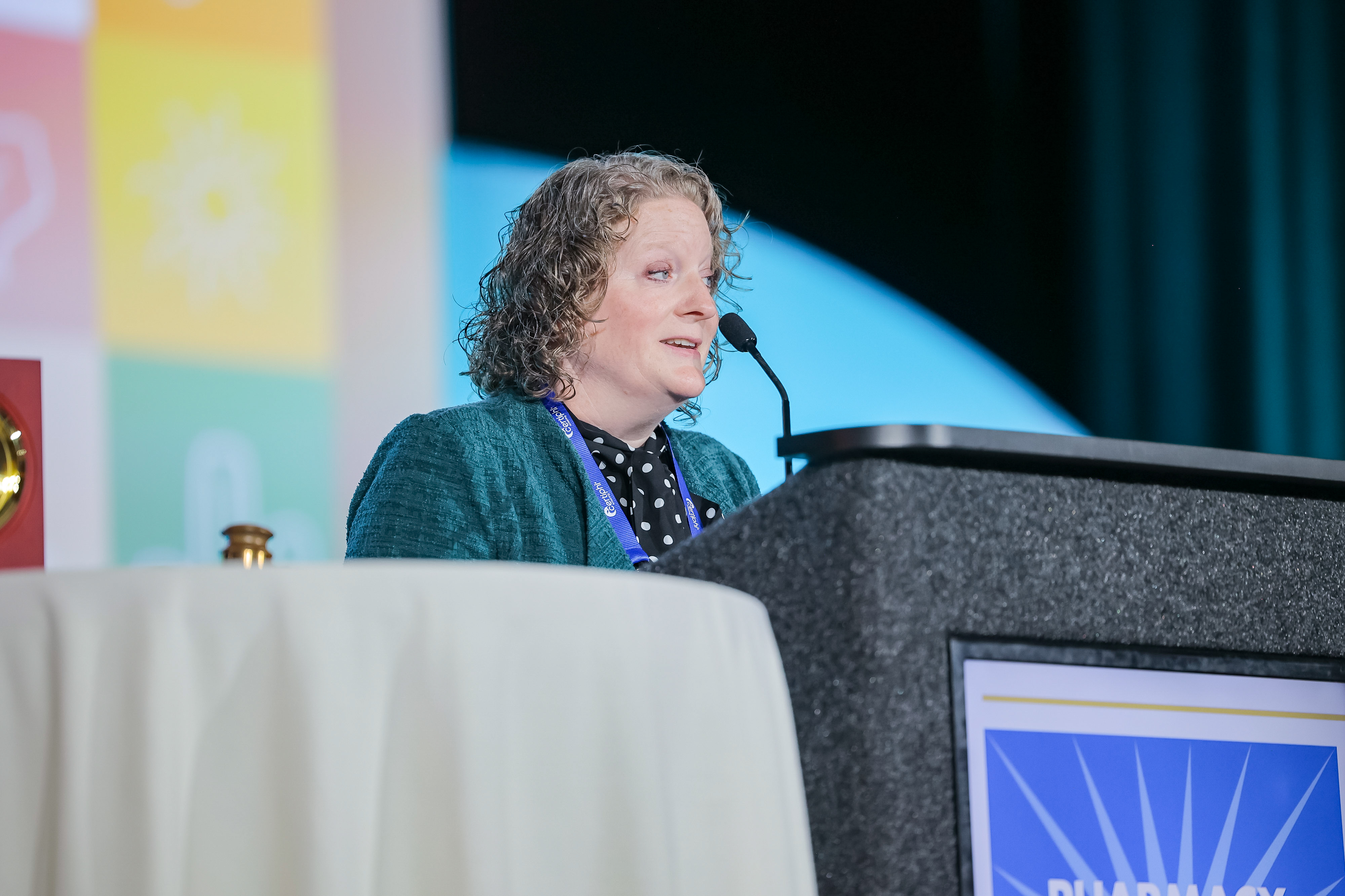Laura Waite at the podium at Pharmacy Education 2026.