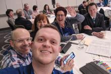 Group work around a table.